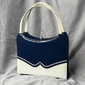 1960’s “RISQUÉ” TOP-HANDLE NAVY & WHITE SPECTATOR HANDBAG